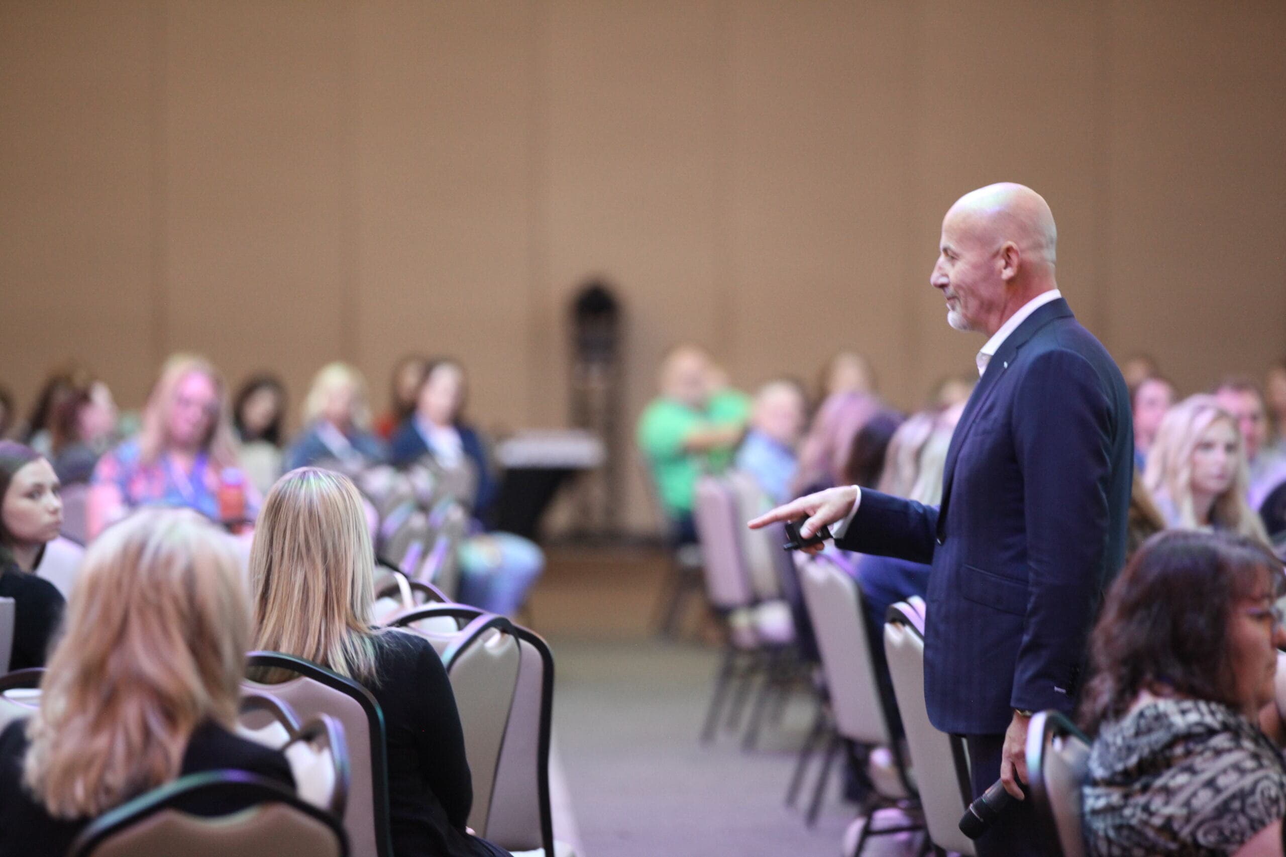 Steve Lowisz engaging an audience during a leadership session