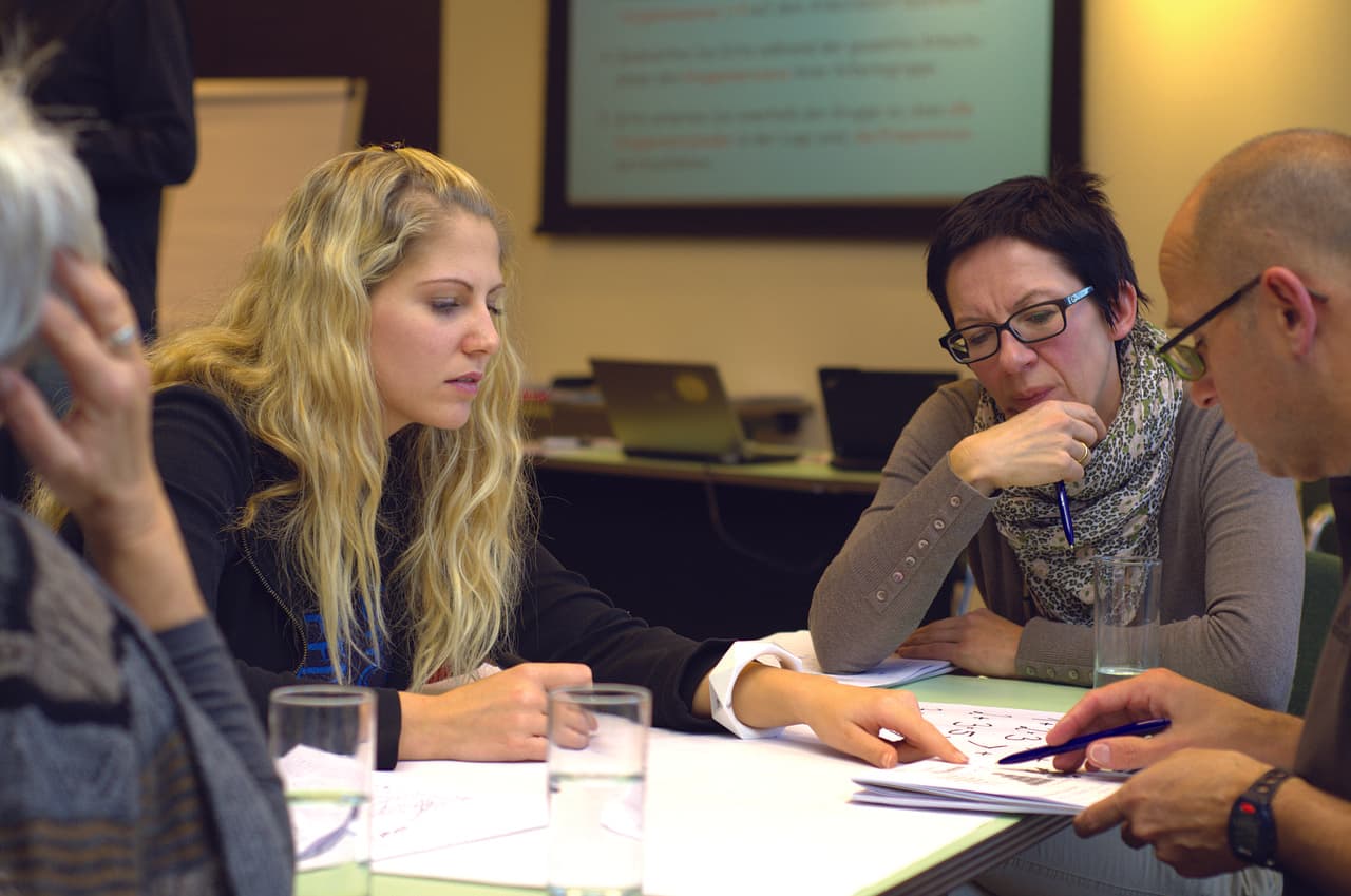 Executive leadership team in a strategic coaching session