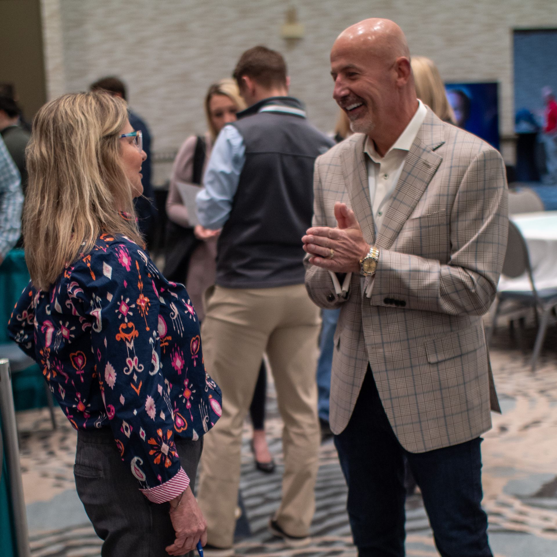 Steve Lowisz engaging with leaders at an event